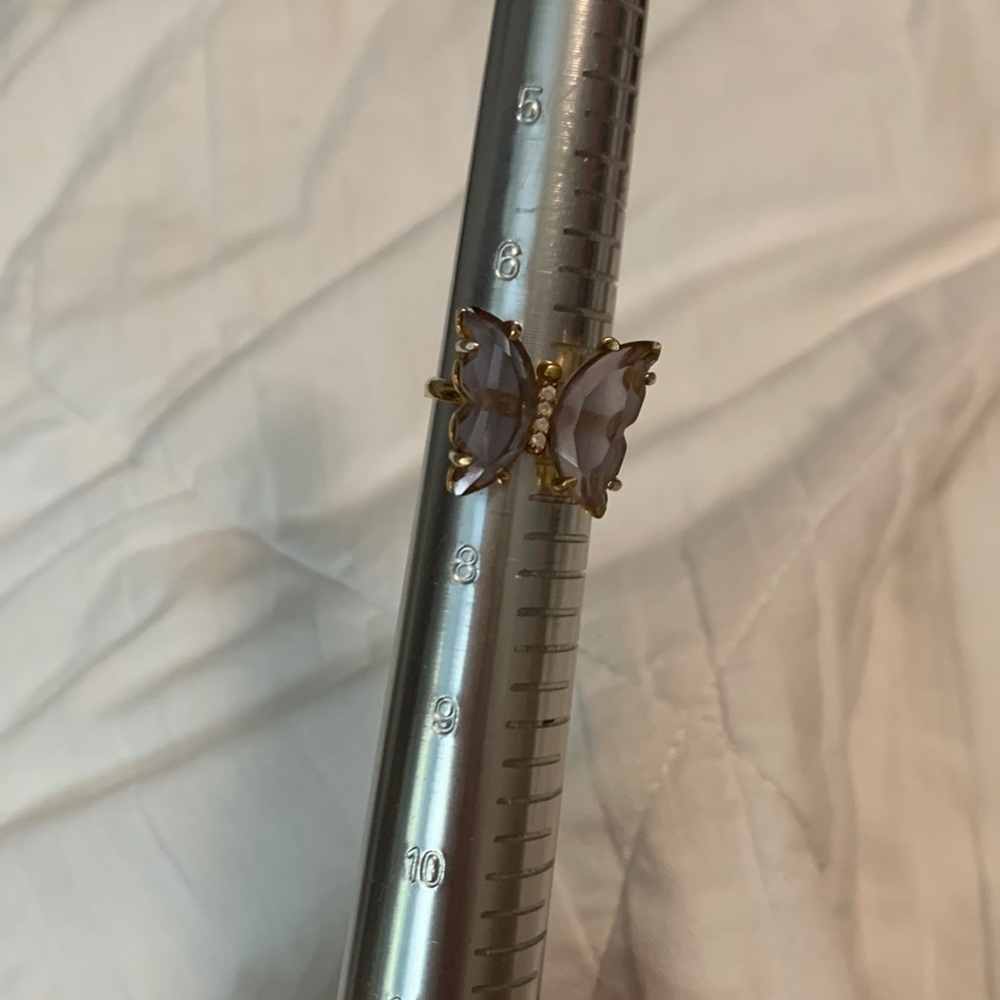 Gold tone purple butterfly ring